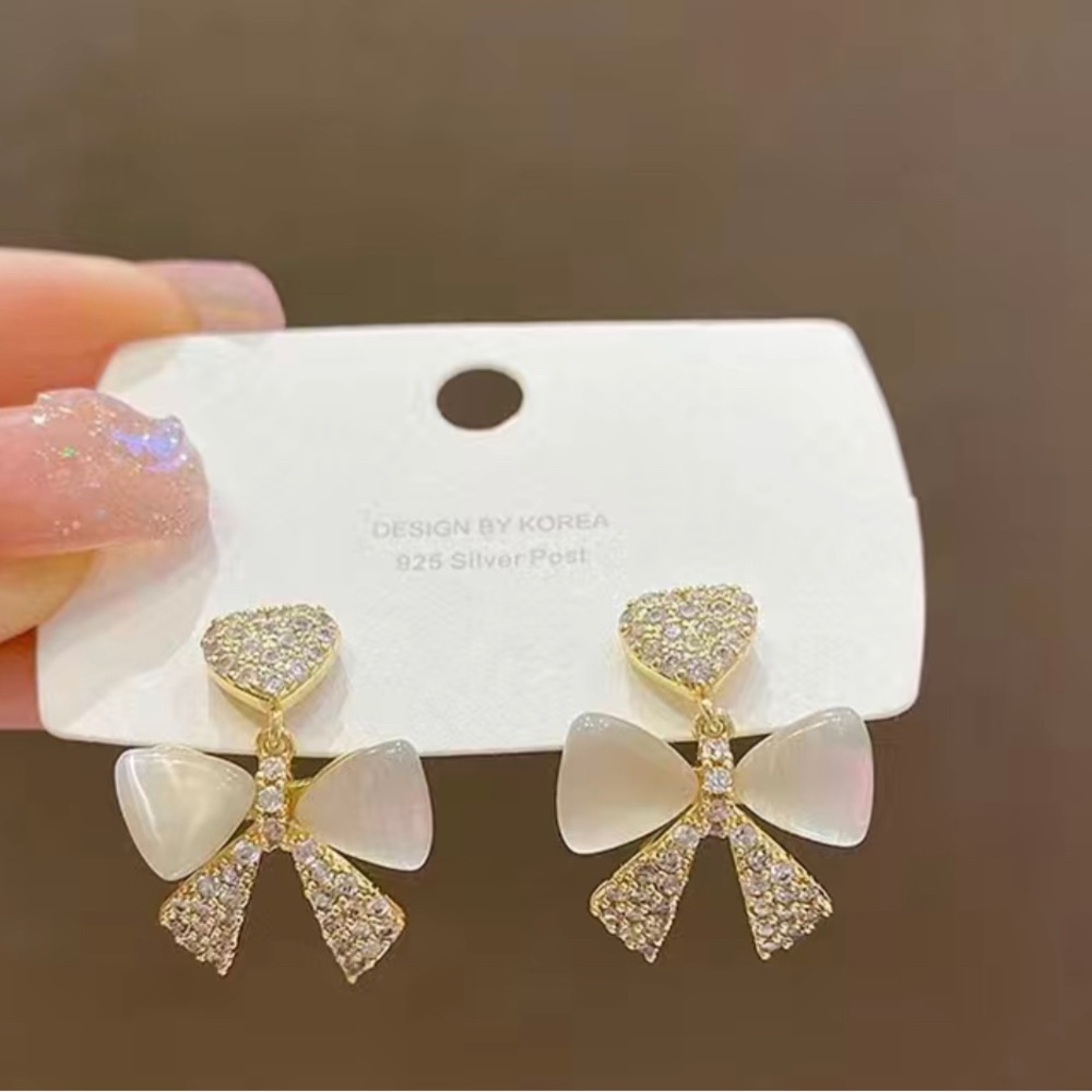 COPY - 🆕❗️Premium Cat Eye Stone Bow Drop Earrings Trendy and Elegant Celebrity … - Picture 5 of 6